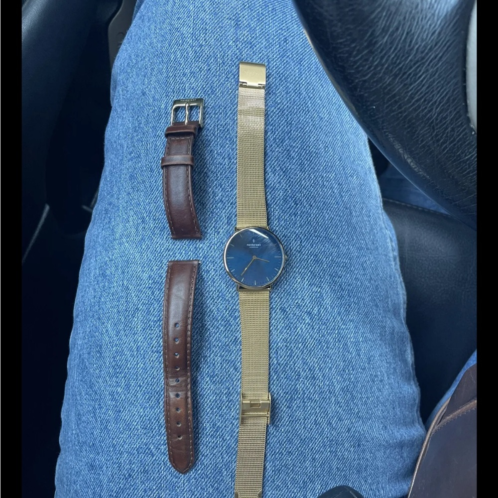 Nordgreen watch set, navy blue face with gold frame. Gold and brown leather band